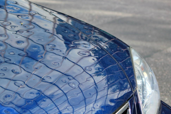 Wie Hagelschadenreparatur Ihrem Auto nach einem Unwetter neuen Glanz verleiht